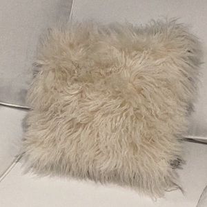 Set of four lamb fur pillow covers in excellent condition.